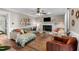 Spacious living room features a fireplace, plush seating, and stylish decor, creating a comfortable and inviting atmosphere at 3541 E Jameson Rd, Raleigh, NC 27604