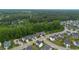 Wide aerial shot of the neighborhood showcasing tree lined streets and the community's layout at 4001 Bostwyck Dr, Fuquay Varina, NC 27526