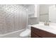 This bathroom includes a shower, toilet, sink, and cabinet for storage at 4001 Bostwyck Dr, Fuquay Varina, NC 27526
