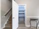 Hallway showing stairs, closet and designer table at 4001 Bostwyck Dr, Fuquay Varina, NC 27526