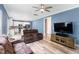 Open-concept layout showcasing a large living room connected to the modern kitchen at 4001 Bostwyck Dr, Fuquay Varina, NC 27526
