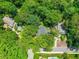 Lush trees provide privacy in this aerial view of the property at 4112 Rowan St, Raleigh, NC 27609
