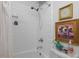 Bathroom with white subway tile and neutral artwork at 4112 Rowan St, Raleigh, NC 27609