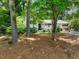 Charming single-story home with beautiful landscaping and mature trees in a desirable neighborhood at 4112 Rowan St, Raleigh, NC 27609
