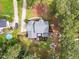 Stunning aerial view of a private backyard oasis with a fire pit and pool at 4412 Thistlehill Ct, Raleigh, NC 27616