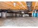 Clean crawlspace with vapor barrier, utilities, and beams ensures a dry and stable foundation at 4412 Thistlehill Ct, Raleigh, NC 27616