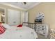 Bright bedroom with large windows, drawers for clothing, and closet access at 5112 Highbury Grove Ln, Fuquay Varina, NC 27526