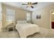 Charming bedroom with a queen bed, soft lighting, and cozy decor at 5112 Highbury Grove Ln, Fuquay Varina, NC 27526