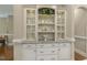 Elegant built-in shelving and cabinets offer ample storage and display space at 5112 Highbury Grove Ln, Fuquay Varina, NC 27526