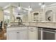 Contemporary kitchen with granite countertops, stainless steel appliances, and an island sink at 5112 Highbury Grove Ln, Fuquay Varina, NC 27526