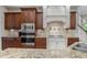 Updated kitchen with modern appliances, granite countertops, and stylish cabinetry at 5112 Highbury Grove Ln, Fuquay Varina, NC 27526