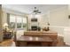 Cozy living room with a fireplace, natural light, and comfortable seating at 5112 Highbury Grove Ln, Fuquay Varina, NC 27526