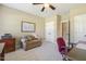 Comfortable home office featuring neutral colors, a cozy chair, and ample workspace at 5112 Highbury Grove Ln, Fuquay Varina, NC 27526