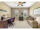 Bright and airy office with a desk, seating area, and plenty of natural light at 5112 Highbury Grove Ln, Fuquay Varina, NC 27526