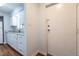 Updated kitchen with white cabinets, granite countertops, and modern appliances at 514 Pine Ridge Pl, Raleigh, NC 27609