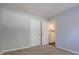 Bedroom featuring laundry closet with a washing machine and dryer set, as well as plenty of storage space at 514 Pine Ridge Pl, Raleigh, NC 27609