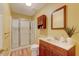 Full bathroom featuring a shower with glass doors, modern vanity, and neutral tones at 578 Jeffries Cross Rd, Burlington, NC 27217