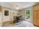 Cozy dining area adjacent to kitchen with backyard access at 578 Jeffries Cross Rd, Burlington, NC 27217