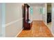 Bright foyer featuring wood parquet flooring and decorative hall tree bench at 578 Jeffries Cross Rd, Burlington, NC 27217