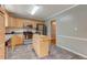 Charming kitchen with stainless steel appliances and a mobile butcher block island at 578 Jeffries Cross Rd, Burlington, NC 27217