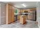 Well-lit kitchen with stainless steel appliances and a center island at 578 Jeffries Cross Rd, Burlington, NC 27217