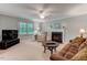 Cozy living room with a fireplace and neutral carpet at 578 Jeffries Cross Rd, Burlington, NC 27217