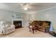 Comfortable living room with fireplace, soft lighting, and plush seating at 578 Jeffries Cross Rd, Burlington, NC 27217