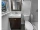 Small, stylish bathroom with a modern vanity, sleek fixtures, and a tiled shower for a refreshed look at 600 Cecil St, Durham, NC 27707