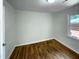 Bedroom featuring hardwood floors and natural light at 600 Cecil St, Durham, NC 27707