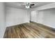 Spacious living room featuring hardwood floors and a ceiling fan at 600 Cecil St, Durham, NC 27707