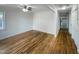Spacious living room featuring hardwood floors and a ceiling fan at 600 Cecil St, Durham, NC 27707