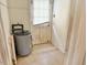 A utility room with a water heater and backdoor at 628 Massey Ave, Durham, NC 27701