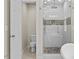 Modern bathroom featuring a glass shower and separate toilet for privacy at 635 Buckroe Dr, Sanford, NC 27330