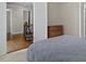 Bedroom with beautiful hardwood flooring, closet, and interior door at 635 Buckroe Dr, Sanford, NC 27330