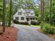 Charming home with a front porch, landscaped yard and long gravel driveway at 635 Buckroe Dr, Sanford, NC 27330