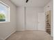 Cozy bedroom featuring a ceiling fan and bright window at 6618 Perry Creek Rd, Raleigh, NC 27616
