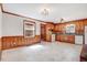 Cozy kitchen featuring wooden cabinets, vintage appliances, and ample countertop space at 905 S 1St St, Smithfield, NC 27577