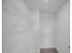 A walk-in closet with white wire shelving on all sides, offering ample storage space at 91 Merle Way Way, Wendell, NC 27591