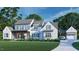 Charming two-story home with a covered porch, white brick, complementing shutters, and a well-manicured lawn at 97 Fox Oak Trl, Pittsboro, NC 27312