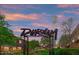 Outdoor Durham art sculpture with water tower landmark, landscaped greenery, and sunset sky at 1002 Regalia Rd # 2, Durham, NC 27713