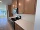 Modern kitchen with stainless steel appliances and quartz countertops at 1002 Regalia Rd # 2, Durham, NC 27713