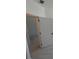 View of a hallway with white colored walls and a closed, white door on the right at 1006 Regalia Rd # 4, Durham, NC 27713