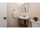 Compact half-bathroom featuring classic fixtures and a clean, minimalist design for convenience and functionality at 1008 Mockingbird Dr, Raleigh, NC 27615