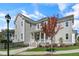 Charming two-story home with a welcoming front porch and well-manicured lawn at 1029 Whitehall Cir, Durham, NC 27713