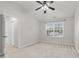 Carpeted bedroom with a ceiling fan, ensuite access and a window at 105 Walehurst Ridge Dr, Angier, NC 27501