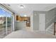 View into kitchen and outdoor living space with sliding glass doors from the living room at 105 Walehurst Ridge Dr, Angier, NC 27501