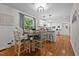 Cozy dining area adjacent to kitchen, perfect for Gathering meals and gatherings at 1052 Hughes Trl, Elon, NC 27244