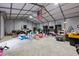 Large garage with ample storage space and recreational equipment; note the American flag at 1052 Hughes Trl, Elon, NC 27244