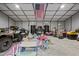 Spacious garage or shed with an American flag and plenty of room for storage and activities at 1052 Hughes Trl, Elon, NC 27244