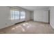 Bright bedroom with carpet flooring and natural light at 1109 N Pinkston St. St, Henderson, NC 27536